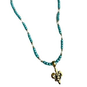 Fleur de lis necklace